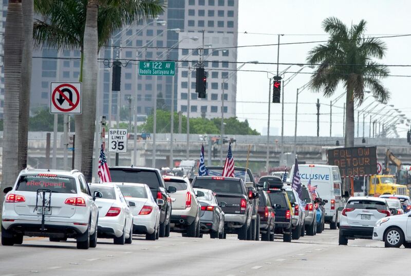 A group of protesters attend the 'Reopen Miami-Dade County' vehicle caravan, calling on state and local officials to reopen Florida's economy, in Miami, Florida, USA.  EPA