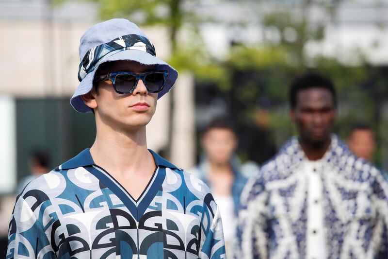 Models present looks from the Dolce & Gabbana Spring / Summer 2021 men's collection in a live-streamed show at the university campus of the Humanitas Research Foundation during Milan Digital Fashion Week. Reuters