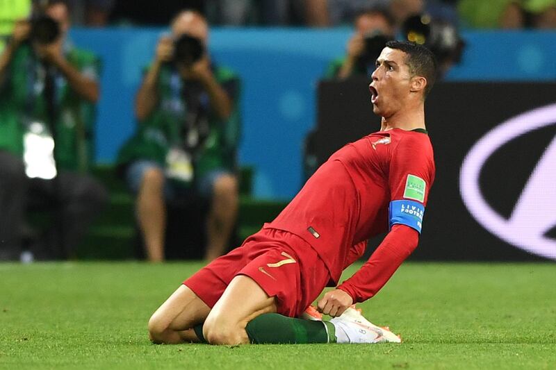 SOCHI, RUSSIA - JUNE 15:  Cristiano Ronaldo of Portugal celebrates after scoring his team's second goal during the 2018 FIFA World Cup Russia group B match between Portugal and Spain at Fisht Stadium on June 15, 2018 in Sochi, Russia.  (Photo by Stu Forster/Getty Images)