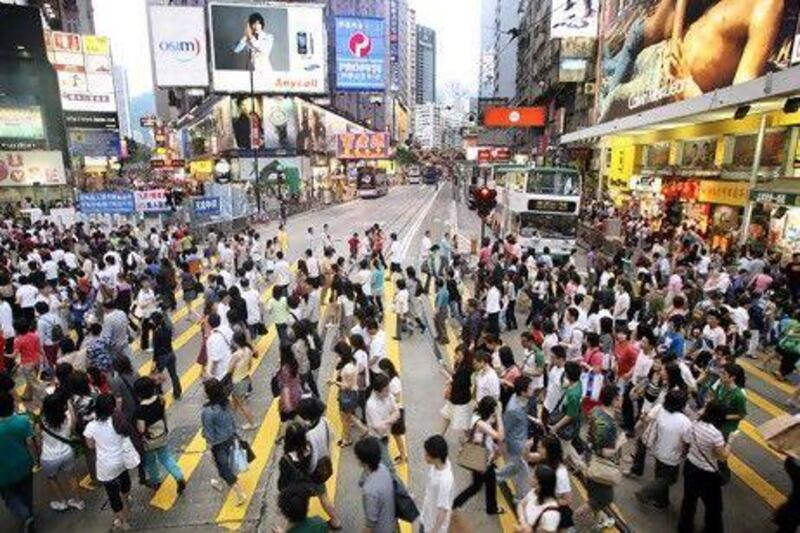 Shoppers pack the street in Hong Kong. The UAE is expected to gain visitors from Hong Kong and China following the opening of direct flights.