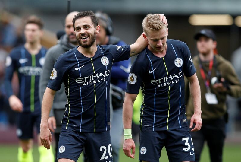 Manchester City's Bernardo Silva and Oleksandr Zinchenko celebrate after the match. Reuters