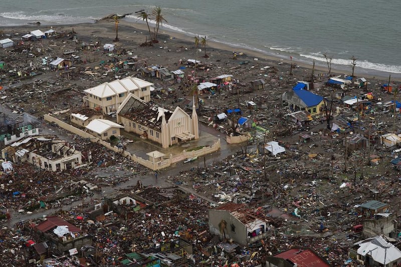 An aerial view shows the damage after Typhoon Haiyan hit the east coast of the Philippines on November 23, 2013.  The number of people dead or missing after one of the world's strongest typhoons struck the Philippines exceeded 7,000, as the United Nations warned much more needed to be done to help desperate survivors. Nicolas Asfouri / AFP