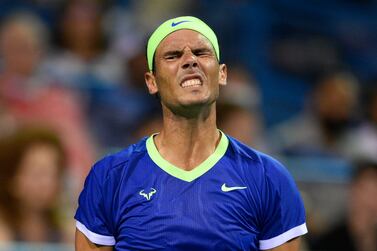 FILE - In this Thursday, Aug.  5, 2021 file photo, Rafael Nadal, of Spain, reacts during a match against Lloyd Harris, of South Africa, at the Citi Open tennis tournament, in Washington.  Rafael Nadal has pulled out of the U. S.  Open and says he will not play tennis again this year because of a nagging foot injury, it was announced Friday, Aug, 20.  The Spaniard sat out both Wimbledon and the Olympics because of fatigue after losing to Novak Djokovic in the French Open semifinals.   (AP Photo / Nick Wass, file)