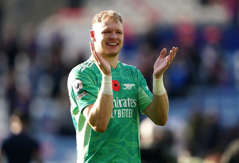 Arsenal goalkeeper Aaron Ramsdale salutes the fans. PA