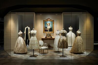 A collection of pale gowns that will appear in New York as part of the Christian Dior: Designer Of Dreams exhibition. Photo by Adrien Dirand 