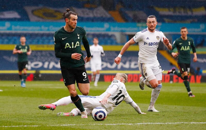 Tottenham's Gareth Bale skips over the challenge of Ezgjan Alioski of Leeds. Reuters