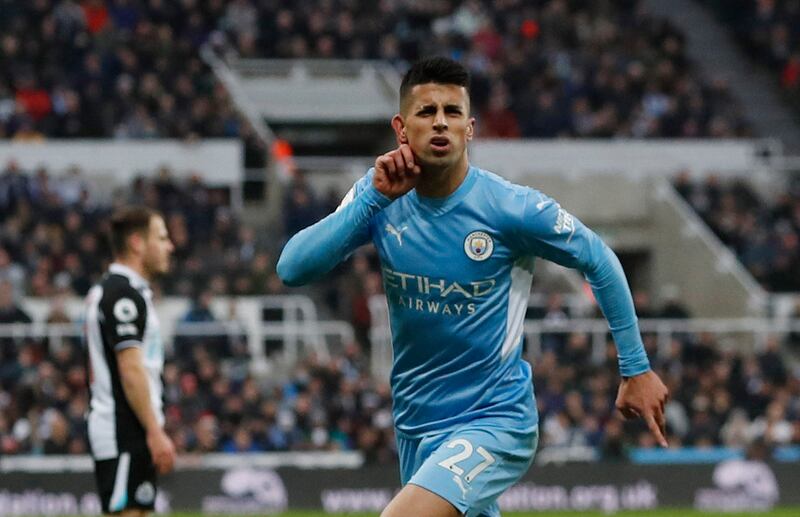 Joao Cancelo celebrates scoring Manchester City's second goal in their 4-0 Premier League win over Newcastle United at St James' Park on Sunday, December 19. Reuters