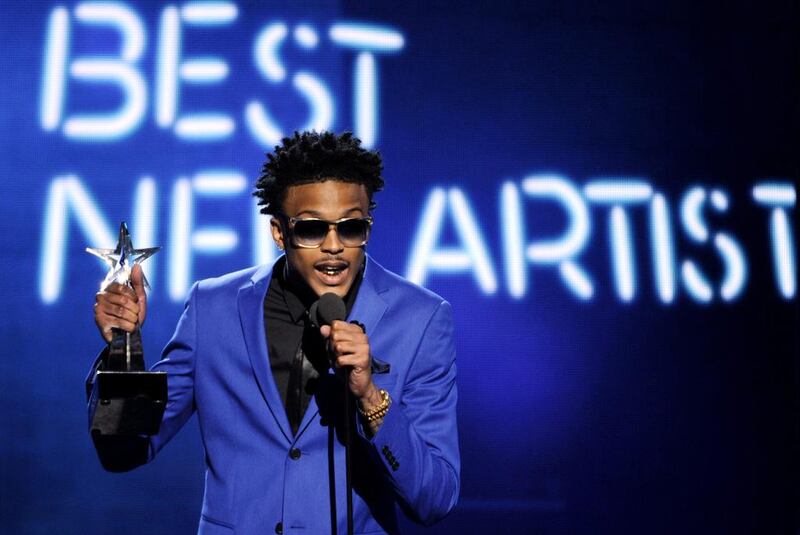 August Alsina accepts the award for best new artist at the BET Awards. Chris Pizzello / Invision / AP