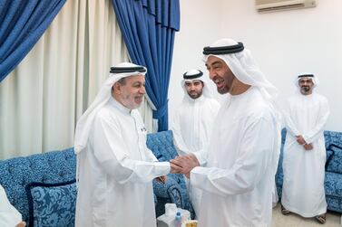 ABU DHABI, UNITED ARAB EMIRATES - October 09, 2017: HH Sheikh Mohamed bin Zayed Al Nahyan, Crown Prince of Abu Dhabi and Deputy Supreme Commander of the UAE Armed Forces (R) visits the home of his former teacher, Ahmed Mandi (L), at Khalifa City. ( Mohamed Al Hammadi / Crown Prince Court - Abu Dhabi ) ---