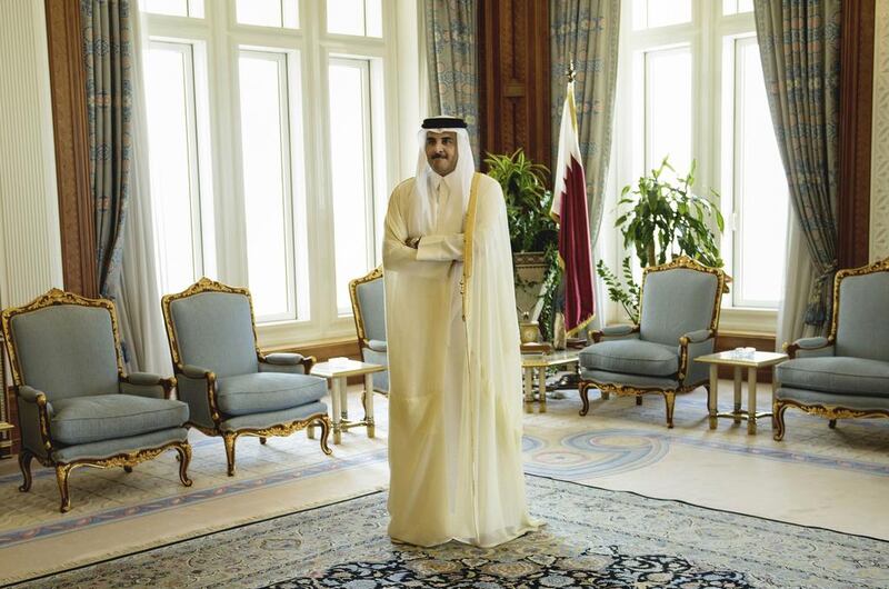 Qatar Emir Sheik Tamim bin Hamad Al-Thani waiting for the arrival of US Secretary of State John Kerry ahead of their meeting at Diwan Palace in Doha. Brendan Smialowski / AP
