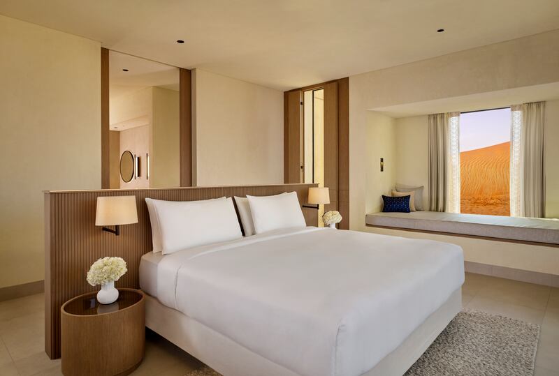 The master bedroom in the signature villa has a window seat and room for an extra bed or baby cot