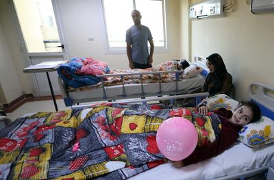 Injured Palestinian children receive treatment at a hospital in Al Arish after being evacuated through the Rafah crossing from Gaza into Egypt. EPA