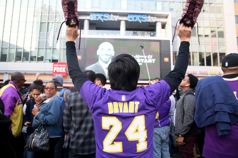 Fans of late Los Angeles Lakers guard Kobe Bryant gather at the LA Live entertainment complex across the street from the Staples Center, home of the Los Angeles Lakers, in Los Angeles, California, USA.  EPA