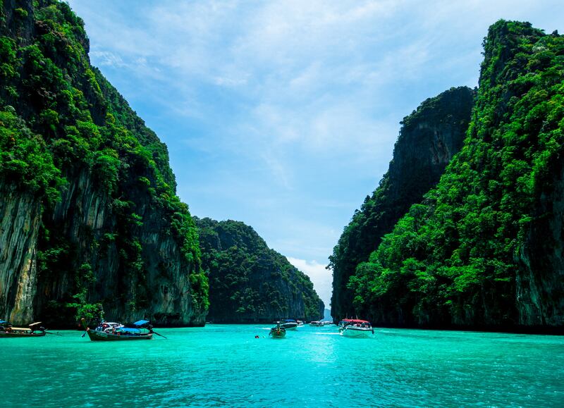 Visitors to Phuket can again enjoy the island’s beaches, restaurants, cafes and hotels. Unsplash / Mike Swigunski