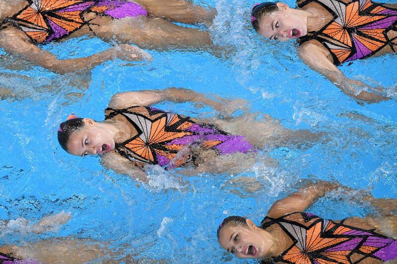 Kazakhstan athletes compete in the women artistic swimming technical routine competition during the 2018 Asian Games in Jakarta, Indonesia. Anthony Wallace/AFP