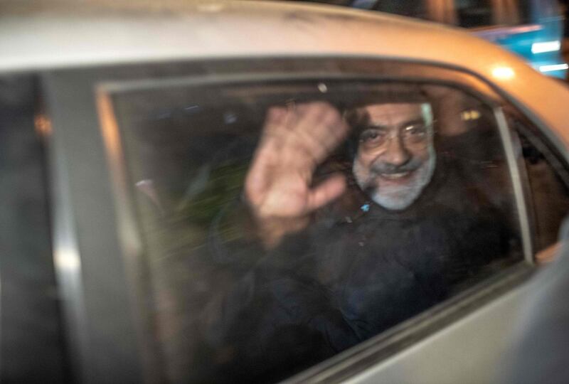 Journalist and writer Ahmet Altan waves in a car as he is detained on November 12, 2019, at Kadikoy neighbourhood in Istanbul. A Turkish court on November 12 ordered the arrest of prominent journalist Ahmet Altan just a week after his release from prison over alleged links to the failed 2016 coup, state media reported. / AFP / BULENT KILIC
