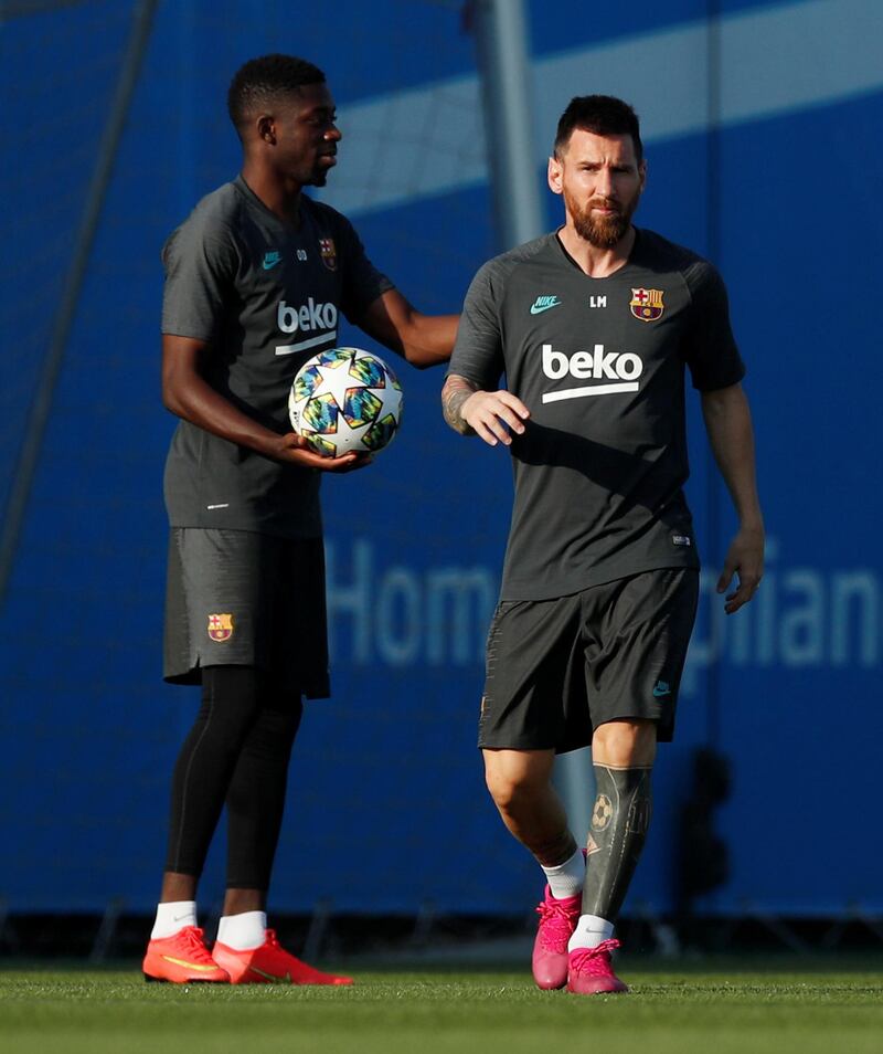 Barcelona's Lionel Messi and Ousmane Dembele during training. Reuters