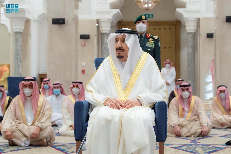 Saudi's King Salman performs prayers for Eid al-Fitr. SPA