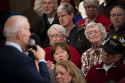 AMES, IA - JANUARY 21: People listen as Democratic presidential candidate, former Vice President Joe Biden speaks during an event on January 21, 2020 in Ames, Iowa. With less than two weeks to go until the Iowa caucus, the candidates are making their case to voters in the state of the first 2020 primary.   Al Drago/Getty Images/AFP
== FOR NEWSPAPERS, INTERNET, TELCOS & TELEVISION USE ONLY ==

