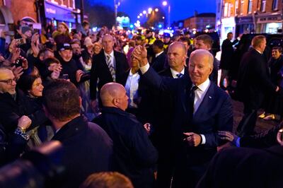 Mr Biden was greeted by crowds in Dundalk after arriving in the Republic of Ireland. AP 