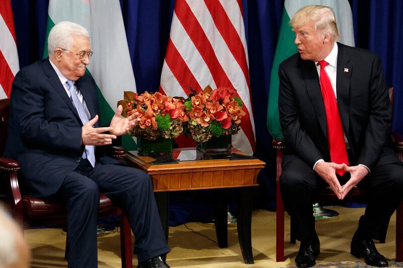 President Donald Trump meets with Palestinian President Mahmoud Abbas at the Palace Hotel during the United Nations General Assembly, Wednesday, Sept. 20, 2017, in New York. (AP Photo/Evan Vucci)
