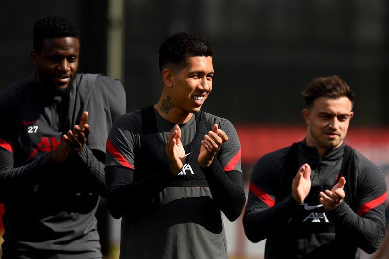 KIRKBY, ENGLAND - MAY 11: (THE SUN OUT, THE SUN ON SUNDAY OUT) Divock Origi, Roberto Firmino and Xherdan Shaqiri of Liverpool during a training session at AXA Training Centre on May 11, 2021 in Kirkby, England. (Photo by Andrew Powell/Liverpool FC via Getty Images)