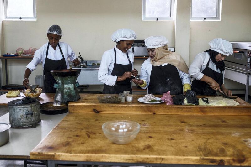 STRICTLY NO USE BEFORE 05:00 GMT (09:00 UAE) 18 JUNE 2020

“We're very close, like sisters."

Hanan Seif Hassan (centre-right), a 32-year-old refugee from Yemen, prepares samosas with her best friend, 26-year-old Ethiopian, Yanchinew Gebeyehu, on a cooking course at Nefas Silk Polytechnic College in Addis Ababa. ; Nefas Silk Polytechnic College in Addis Ababa is the first to accommodate refugees and Ethiopians studying together in vocational subjects like cooking, woodwork and mechanics. In January 2019, Ethiopia passed historic new laws giving refugees the right to work permits, primary education, birth and marriage registration, and banking. This paved the way for some of the 700,000 refugees who found refuge here from violence and persecution in South Sudan, Somalia, Eritrea, Sudan and Yemen to join the country’s Technical and Vocational Education and Training programme. With Germany’s international development agency (GIZ) funding a five-year integrated training project alongside the Ethiopian Government, UNHCR and partner NGOs, refugees and locals are improving their job opportunities and developing the skills to help respond to Ethiopia’s labour market needs.