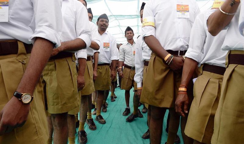 Volunteers from Indian right-wing organisation Rashtriya Swayamsevak Sangh (RSS) queue as they arrive for a rally in Pune, some 135km south-east of Mumbai, on January 3, 2016. Indranil Mukherjee/AFP Photo