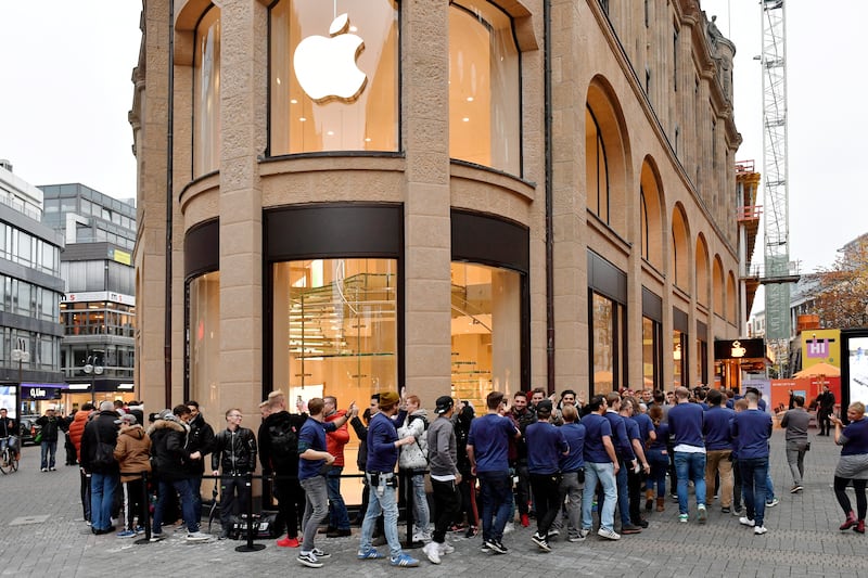 The Apple store at Schildergasse in Cologne, Germany. It has room for local artists to be displayed, plus a hanging glass staircase. EPA