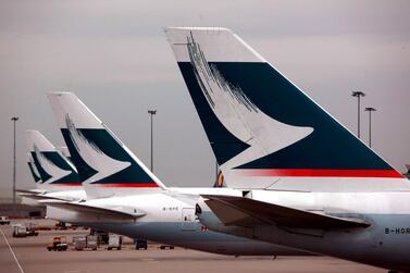 Cathay Pacific planes at Hong Kong International Airport - the airline has agreed with Airbus to delay deliveries of aircraft by as much as two years. EPA
