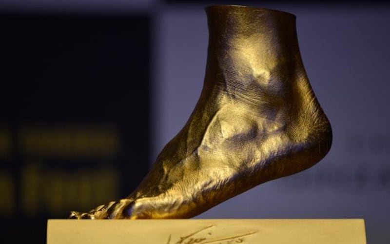 A 25kg replica of Lionel Messi's foot, cast in solid gold.  Pic: Franck Robichon/EPA