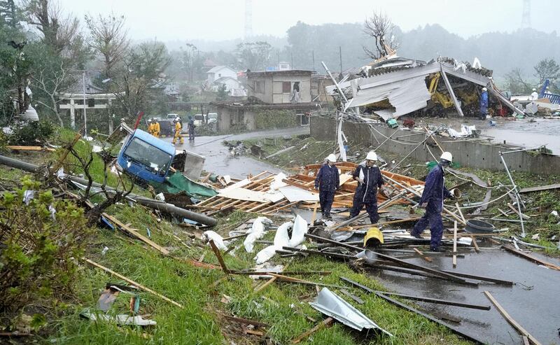 Destroyed houses, cars and power poles, which according to local media were believed to be caused by a tornado, are seen as Typhoon Hagibis approaches the Tokyo area in Ichihara, east of Tokyo, Japan. Reuters