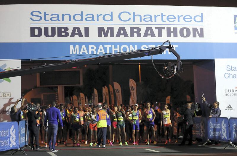 DUBAI, UNITED ARAB EMIRATES , Jan 24  – 2020 :- Runners getting ready at the starting point during the Standard Chartered Dubai Marathon 2020 held on the Umm Suqeim Road in Dubai. ( Pawan  Singh / The National ) For News/Online/Instagram.