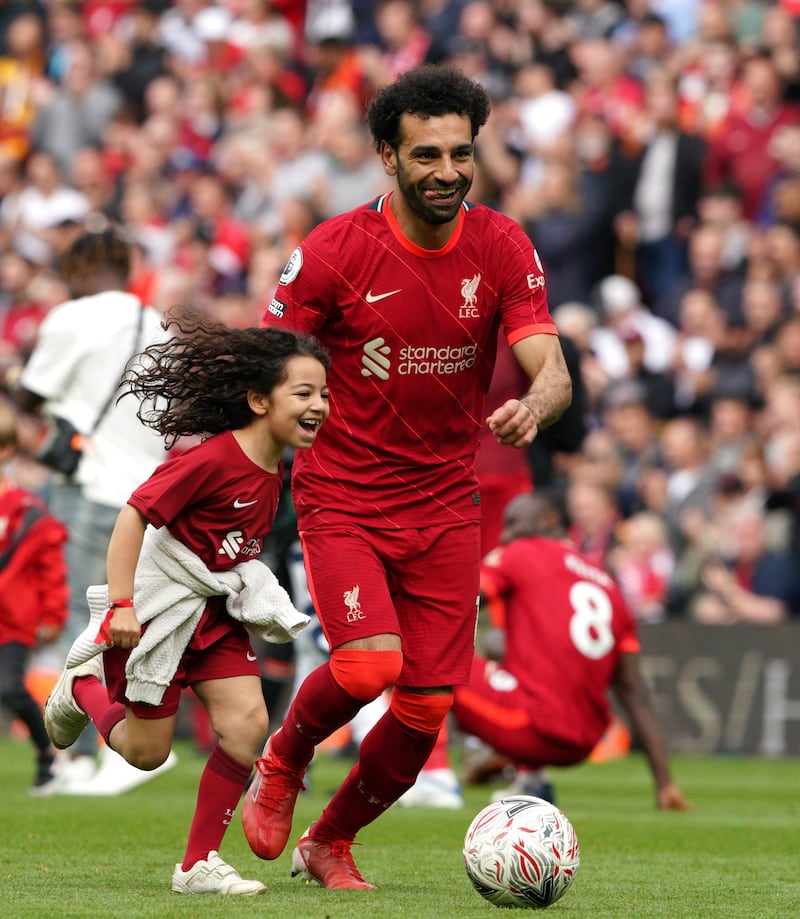 Liverpool's Mohamed Salah plays football with his daughter Makka Mohamed Salah. PA