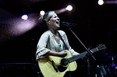 British singer Dido performs on stage during an event marking the start of "Octobre Rose" (Pink October) or Breast Cancer Awareness Month, on October 1, 2019 in Paris. / AFP / STEPHANE DE SAKUTIN
