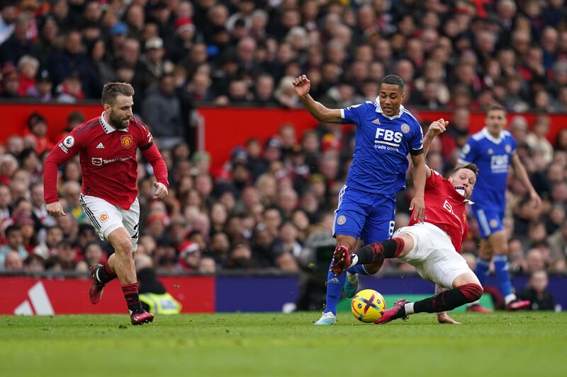 Leicester City's Youri Tielemans is tackled by Manchester United's Wout Weghorst. PA