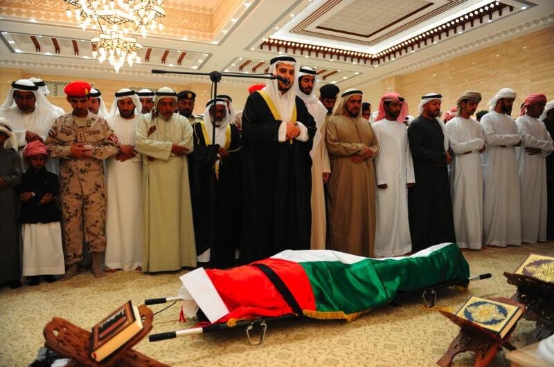 Men perform funeral prayers over the body of Abdullah Mohammed Al Kaabi at the Martyr Abdul Aziz Sarhan Al Kaabi Mosque in Al Foah, Al Ain, in the presence of Sheikh Shakhboot bin Nahyan bin Mubarak. Wam