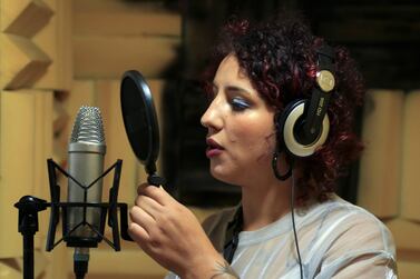 Moroccan rapper Houda Abouz, 24, known by her stage name "Khtek", records a song inside a studio in Rabat, Morocco July 20, 2020. Picture taken July 20, 2020. REUTERS/Shereen Talaat