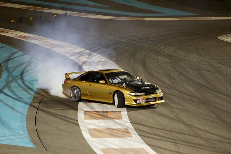 A drifter shows his skills at Yas Circuit. Christopher Pike / The National