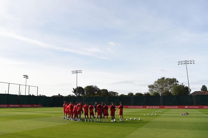 Liverpool players take part in a training session at their Melwood complex. AFP