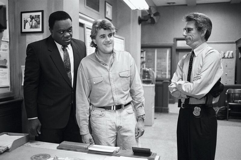 THE TONIGHT SHOW WITH JAY LENO -- Pictured: (l-r) Yaphet Kotto, Jay Leno, Richard Belzer on the set of Homicide: Life on the Street in October 1995 -- (Photo by: NBCU Photo Bank/NBCUniversal via Getty Images via Getty Images)