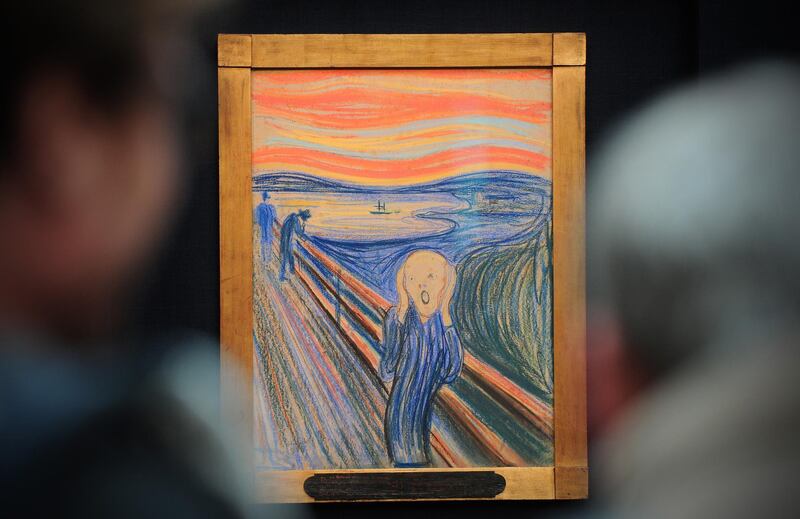 People view the Norwegian artist Edvard Munch's 1895 pastel on board work entitled 'The Scream' at Sotheby's auction house in central London on April 12, 2012. The work is expected to fetch around 80 million USD (around 50 million GBP) when it is auctioned at the Impressionist and Modern Art Evening sale in New York on May 2, 2012. AFP PHOTO / CARL COURT (Photo by CARL COURT / AFP)