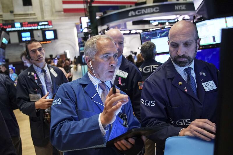 NEW YORK, NY - OCTOBER 02: Traders and financial professionals work on the floor of the New York Stock Exchange (NYSE) at the closing bell on October 2, 2019 in New York City. The Dow Jones Industrial Average has dropped over 800 points in the first two days of trading in October. The drop comes after reports showed slowing in September for both manufacturing and hiring.   Drew Angerer/Getty Images/AFP
== FOR NEWSPAPERS, INTERNET, TELCOS & TELEVISION USE ONLY ==
