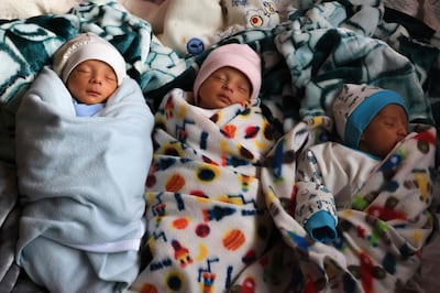 Three of the al-Masri quadruplets. The fourth is still being treated in hospital. AFP
