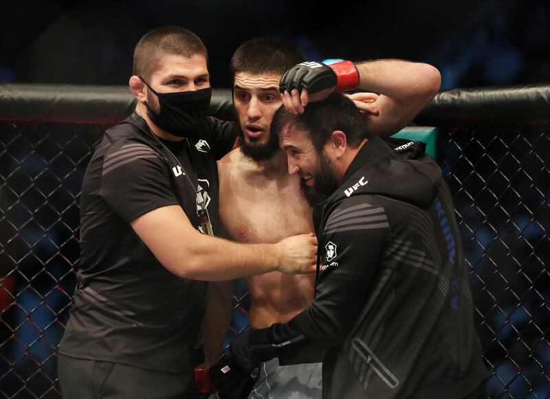 Khabib Nurmagomedov celebrates Islam Makhachev's lightweight bout win over Dan Hooker.