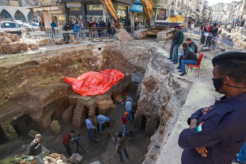 The ruins of a recently discovered Roman archaeological site in Amman, the capital of Jordan, are uncovered on the site of a water drainage system. AFP