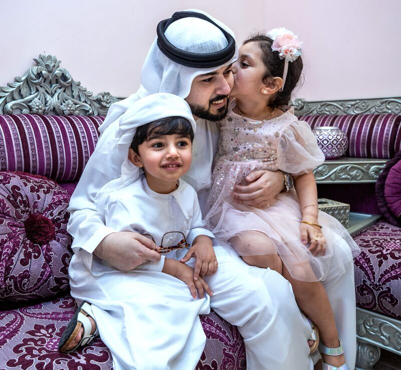Sultan Al Shamsi with children, Noora, 4 and Rashid, 3.  Victor Besa / The National