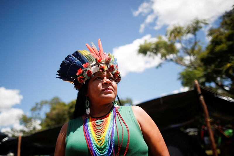 Indigenous leader Sonia Guajajara of the Guajajara tribe poses for a picture at the Terra Livre (Free Land) camp, a protest-camp to defend indigenous land and cultural rights that they say are threatened by the right-wing government of Brazil's President Jair Bolsonaro, in Brasilia, Brazil April 4, 2022.  Reuters