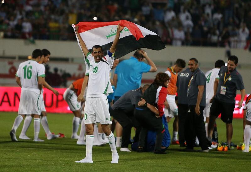 Younus Khalaf (No 10) and his Iraq teammates celebrate a 3-1 victory in the only qualifying game of consequence for the Asian Cup 2015 in Sharjah on Wednesday, March 5, 2014. Pawan Singh / The National