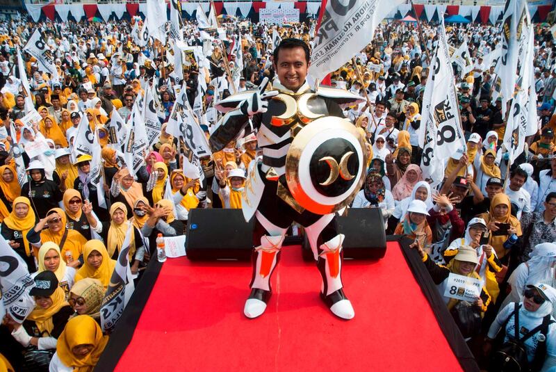A supporter of presidential candidate Prabowo Subianto in costume during an election campaign rally in Bandung. AFP